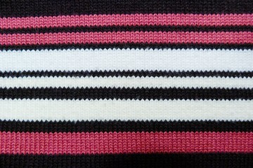 striped knitted knitted closeup background black red white