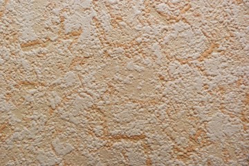 beige stucco wallpaper closeup background