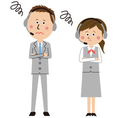 グレーのスーツの ポップなオペレーターの男女が困る