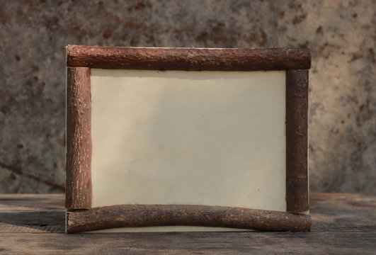 wooden frame on the wooden table