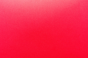 Red gradient color with texture from real foam sponge paper for background, backdrop or design.