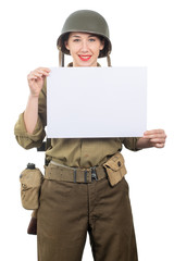 young woman dressed in American ww2 military uniform showing empty blank signboard