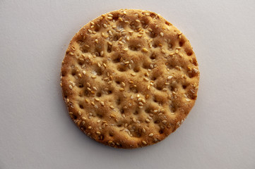 Cookies with sesame on white background