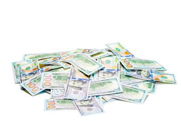 Obraz na płótnie Canvas A pile of 100 dollar bills piled on white background isolated