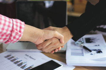 Business teamwork handshake cooperation concept.