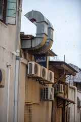 The BBQ restaurant ventilation system with air ducts for ventilate vacuum odor and smoke from the kitchen and BBQ tables to outdoor area.