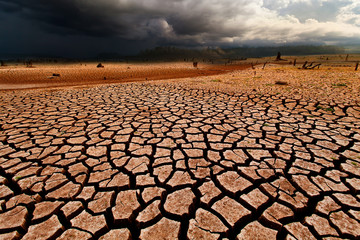 thunder storm sky Rain clouds Cracked dry land without wate