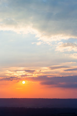 colorful dramatic sky with cloud at sunset.