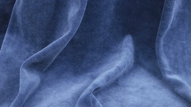 Velvet of cornflower blue color, drapery, background