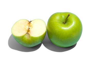 Ripe parts green apple Isolated on a white background. Healthy eating and dieting concept