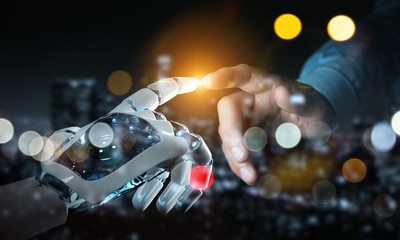 Robot hand making contact with human hand on dark background 3D rendering