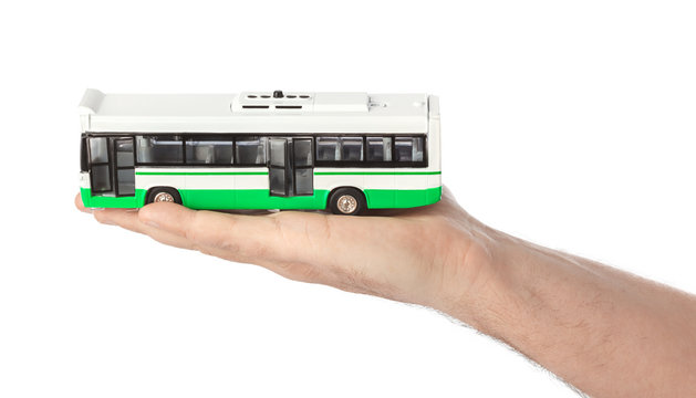 Hand With Toy Bus