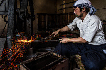 Swordsmith making Japanese swords