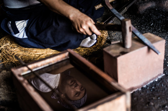 Swordsmith making Japanese swords