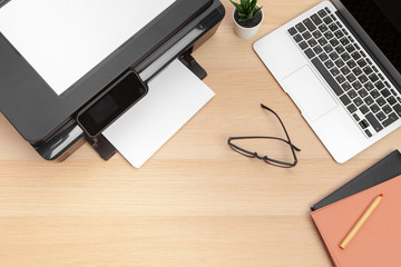 Printer and computer. Office table. Top view.