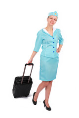 Stewardesse - Charming and smiling Stewardess Dressed In Blue Uniform And Suitcase . Isolated on white background