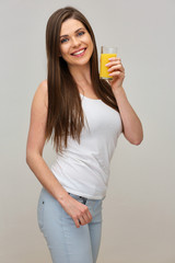 woman has vitamin with orange juice.