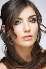 Fototapeta premium young woman with long curly hair