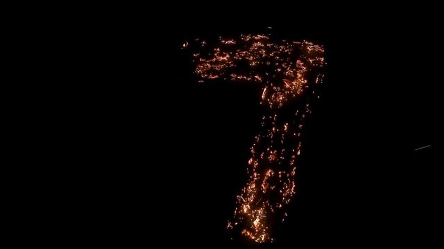 Number seven 7 burning, smoldering