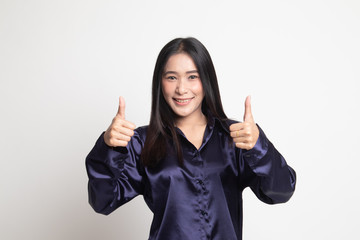 Young Asian woman show two thumbs up.