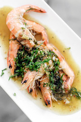asian prawns sauteed in spicy garlic chilli and turmeric sauce