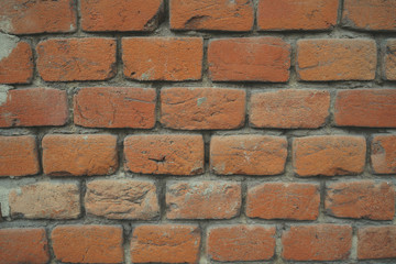 Rough aged masonry background Backdrop of old red bricks with shabby texture