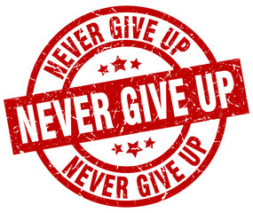 never give up round red grunge stamp