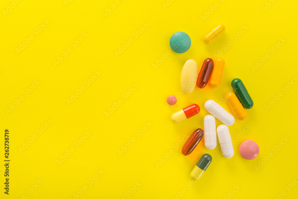 Wall mural Pile of colored capsule pills