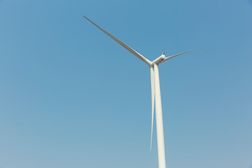 A Wind Turbine with blue sky.
