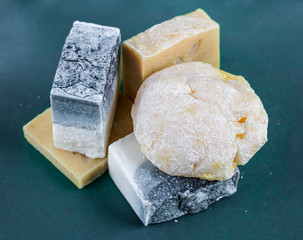 handmade soap on green background