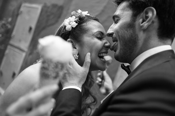 Bride and groom eating ice cream