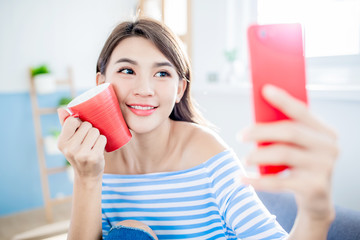 beautiful woman taking selfie