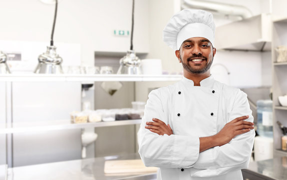 Indian chef standing in the kitchen Stock Photo by ©realinemedia 99236620