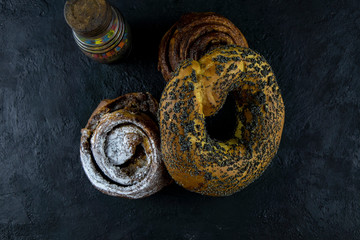 Sweet buns on a dark stone background