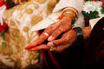 Indian wedding  photography ,groom and bride hands