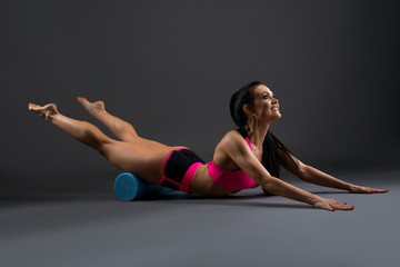 Gorgeous fitness model in pink sportswear shot