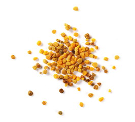 Bee pollen pile isolated on white background, top view