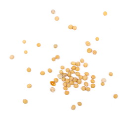 Yellow mustard seeds macro isolated on white, top view