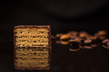 candies waffles chocolate filled (cream filling). food background. top view
