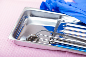 Sterilized dental instruments on a tray close-up