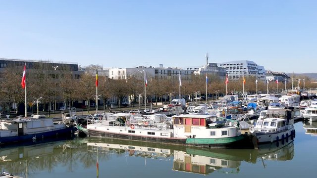 Nancy, France - february 16th 2019. View on the marina of Nancy, a city in north east France. Located on the Moselle river. Blue sky, sunny day.