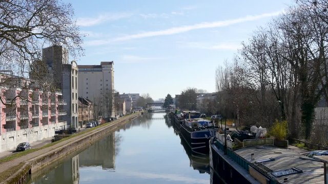View on the moselle river in nancy, north east France. Nancy is a city located in north east France. Reflection on the water.