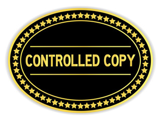 Black and gold color sticker in word controlled copy on white background