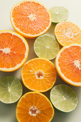 Composition with slices of citrus on color background