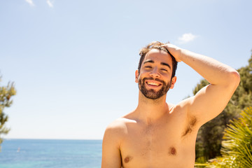 man sunbathing on the beach