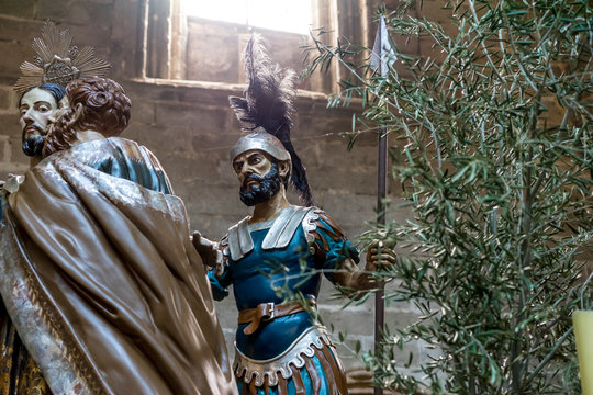 Avila, Spain - April 17, 2019.  the orchard of the olive trees, religious images of the Holy Week footsteps inside the Cathedral of Ávila, Spain