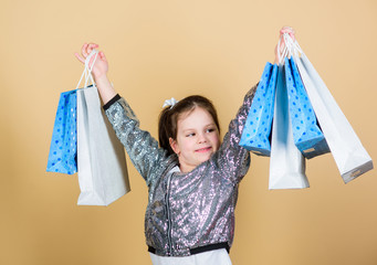 Shopping and purchase. Black friday. Sale discount. Shopping day. Child hold bunch packages. Kids...