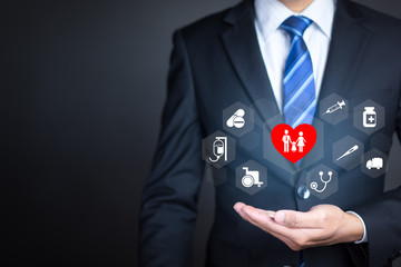 Health insurance concept,  Businessman with protective gesture and healthcare medical icon