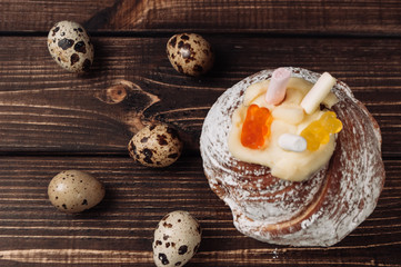 fresh pastries on a wooden table and quail eggs