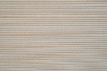 Ecru ceramic tile with horizontal lines on wall